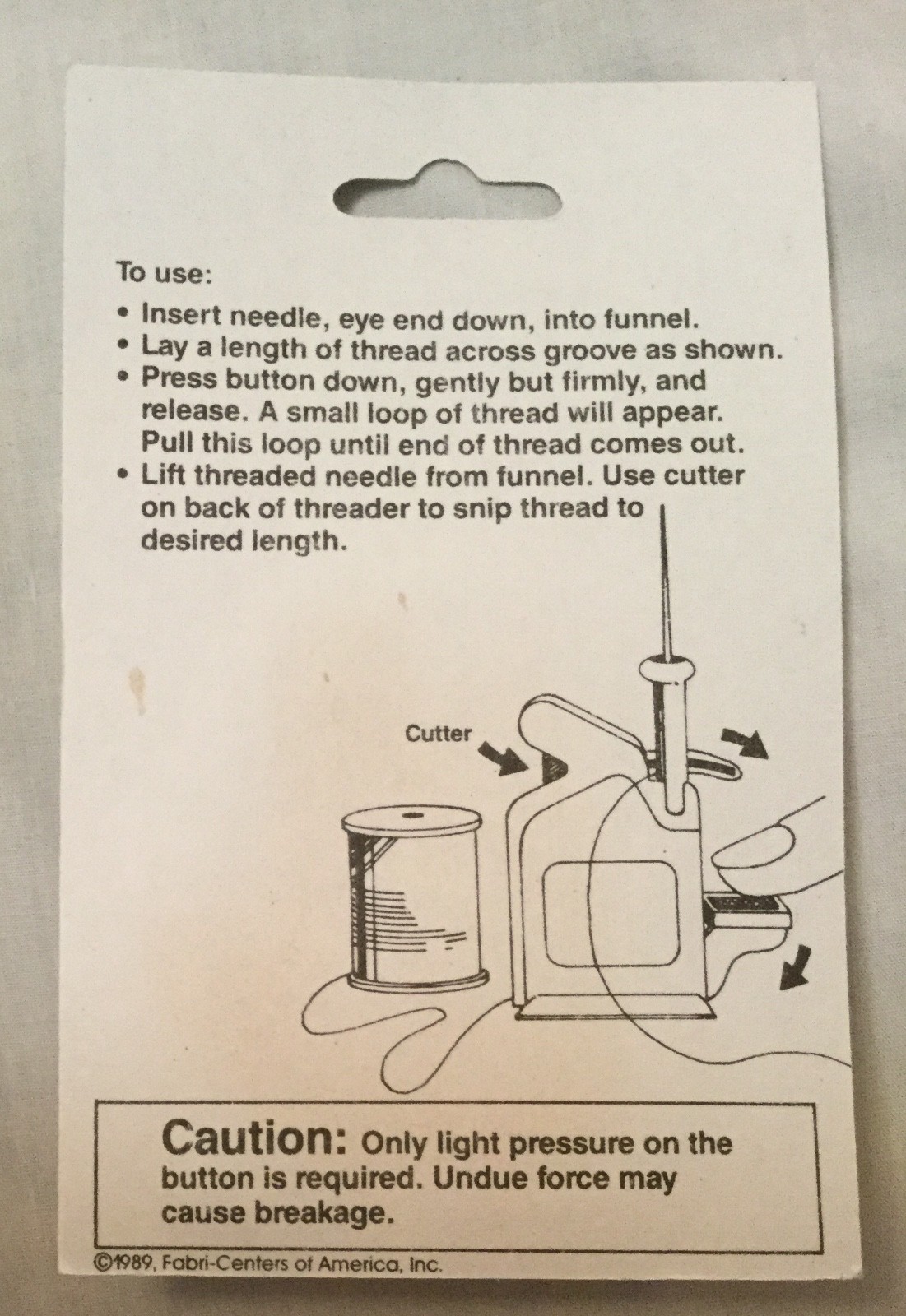 Easy Needle Threader by Beachwood, Ltd. 1989 Fabri-Centers of America, Inc