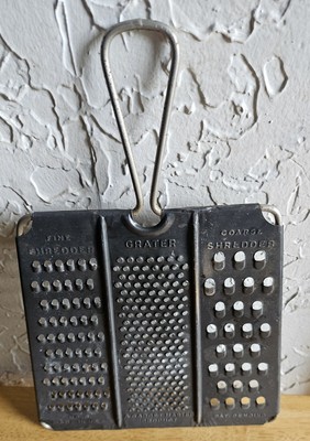 The Gadget Master Grater Metal Flat Grater Cheese Grater.