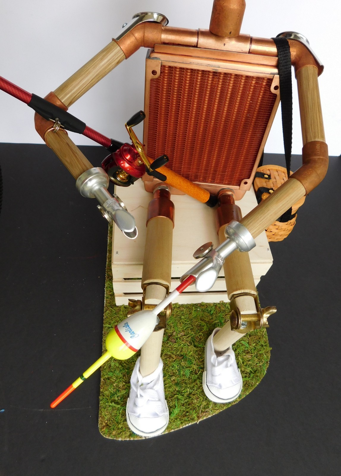 fisherman sculpture, assemblage robot