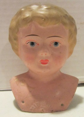 1 antique tin head 12
