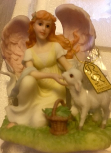 Ceramic Figurine...new in Box....so Detailed