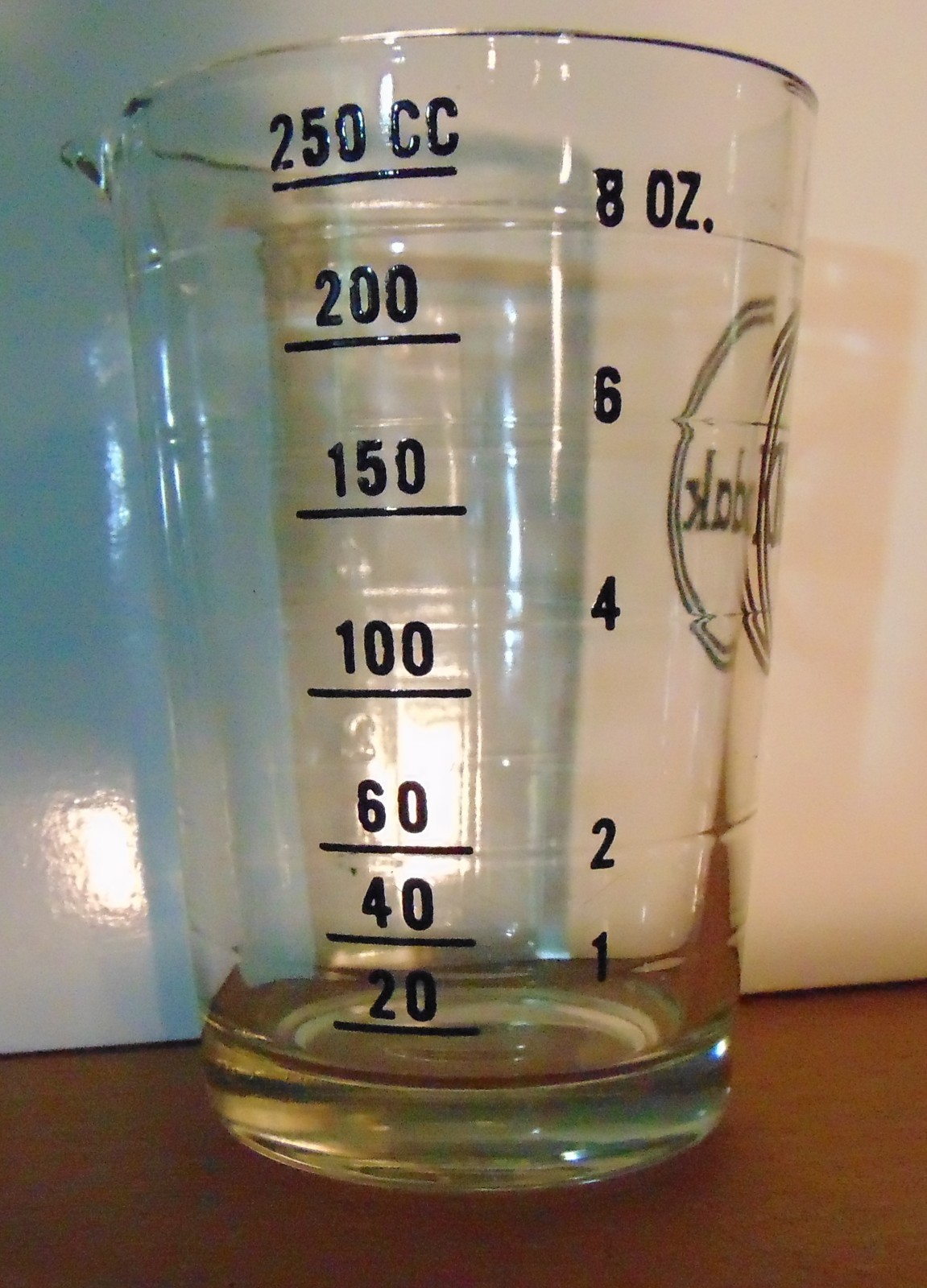 Kodak photography chemical measuring cup.