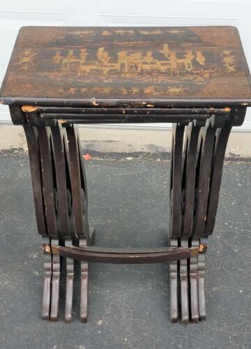 4 ASIAN THEMED  SMALL WOOD NESTING TABLES. BLACK WITH INTRICATE GOLD DESIGN