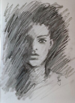 Charcoal Face . Two A4 portraits in pencil and charcoal.