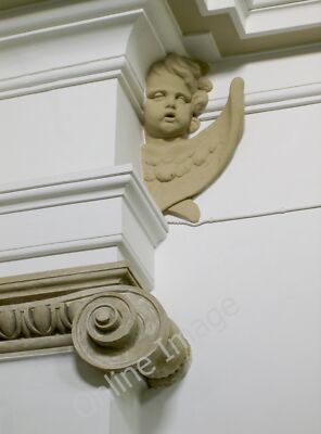 Photo 6x4 Peeking out from the corner Barton Hill/ST6072 A cherub mouldi c2011