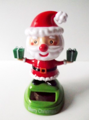 olar Powered Bobble Head Santa Claus  / Holding Two Presents