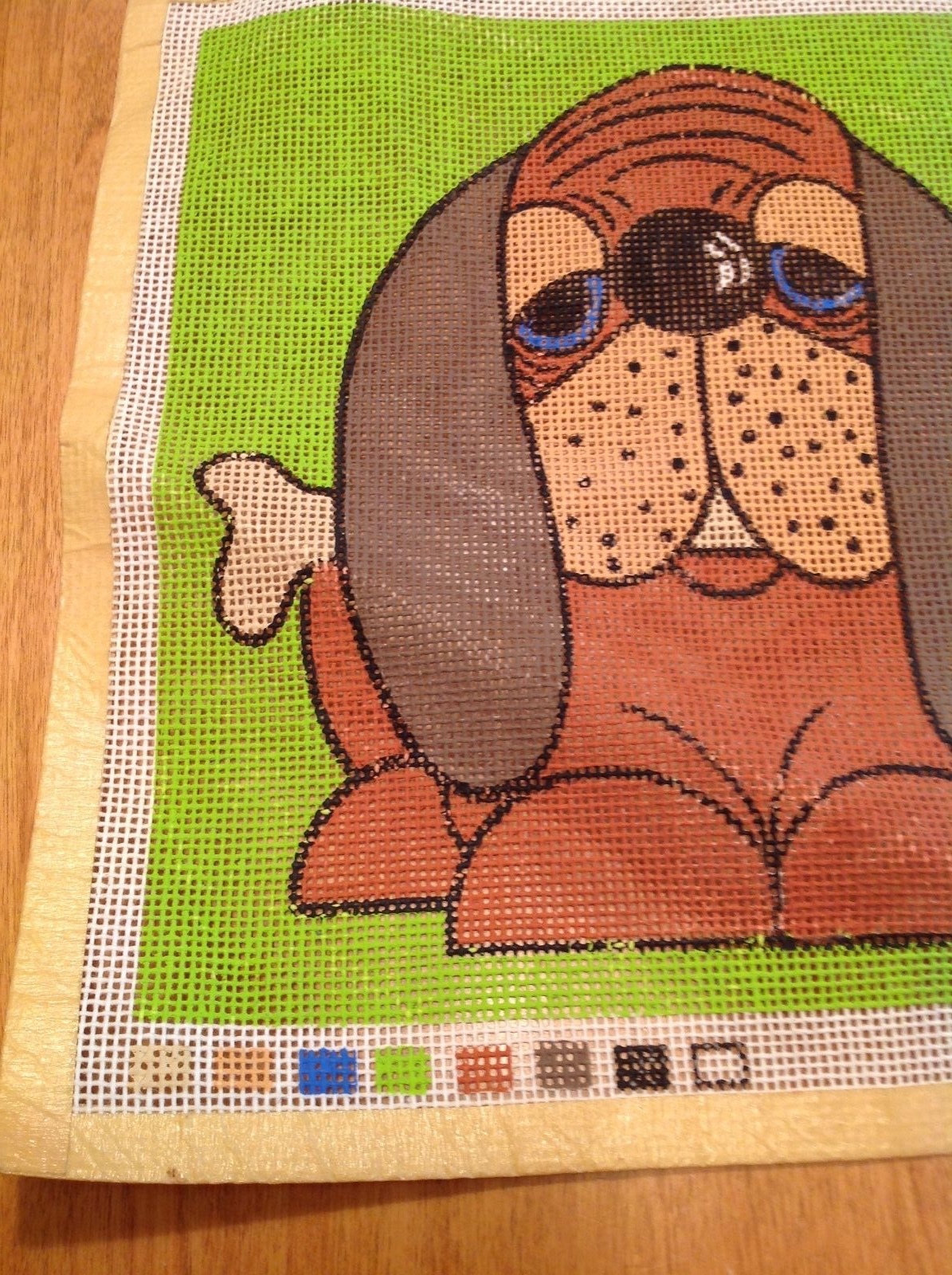 Hand painted Needlepoint Canvas Silly Basset Hound With Bone