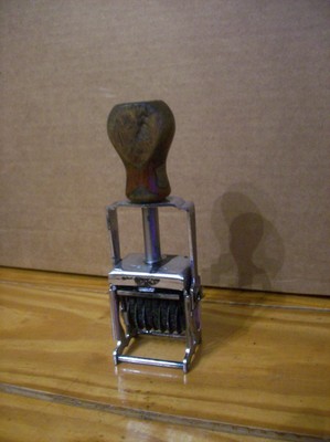 Vintage Triumph Ink Stamper with Wood Handle