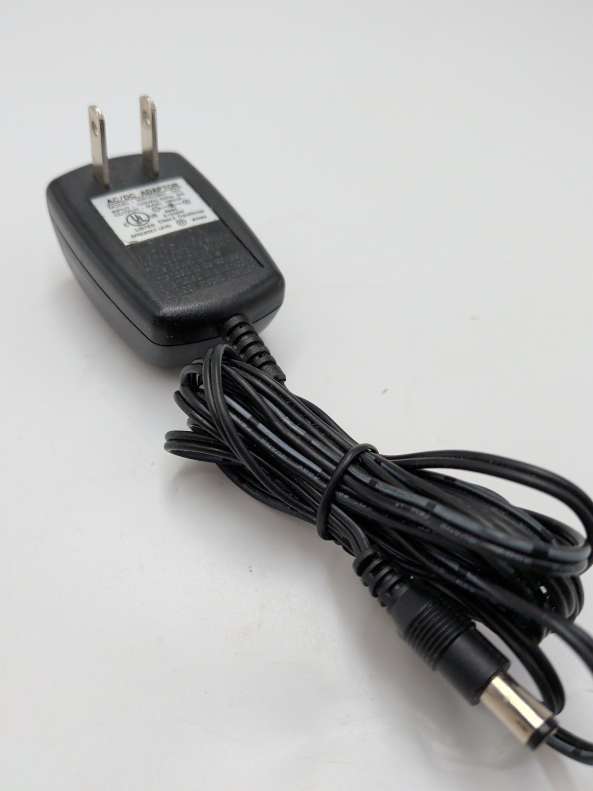KW10106C AC DC Adapter Charger Input 120V 60Hz 3W Output 9 VDC 100mA