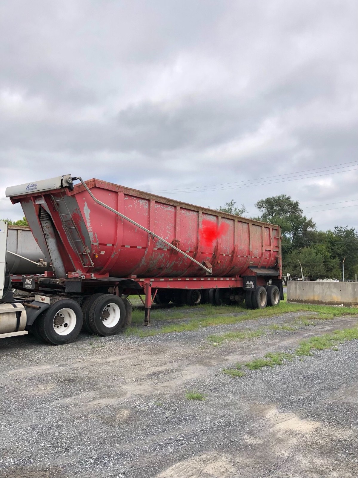 Red JMH demolition dump trailer