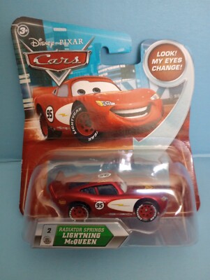 DISNEY PIXAR CARS 2010  LIGHTNING McQUEEN #1 RUST-EZE LOOK MY EYES CHANGE  NIB