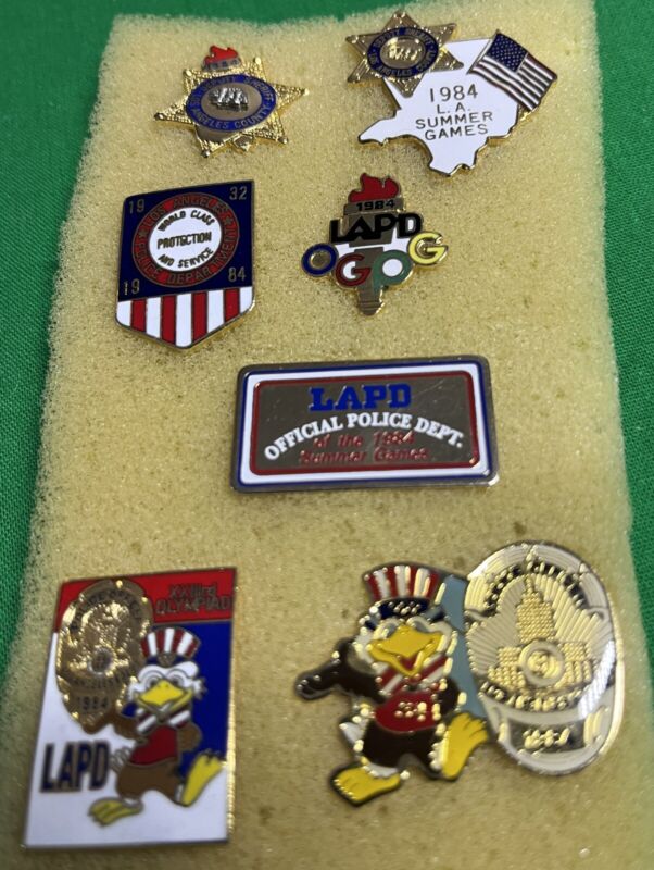 SEVEN (7) Los Angles Olympic Police Department Pins.  C