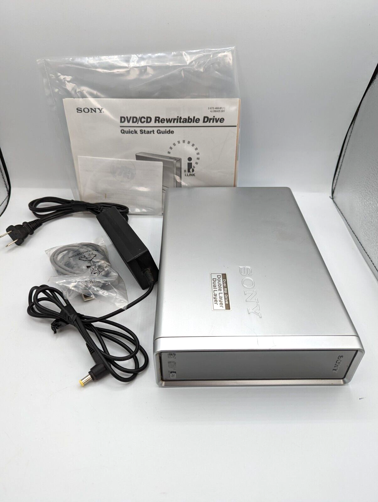 SONY DRX-830U, DVD/CD Rewritable Drive with stand cables and manual SONY DRX-830U, DVD/CD Rewritable Drive with stand cables and manual