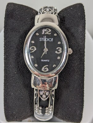 Studio Black Dial Oval Silver Tone Case Crystal Accent Black Inlay Hinge Watch
