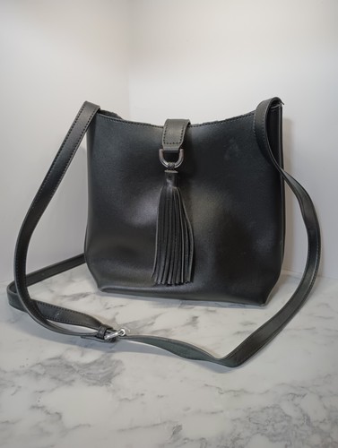 Black Leather With Tassel. Preowned
