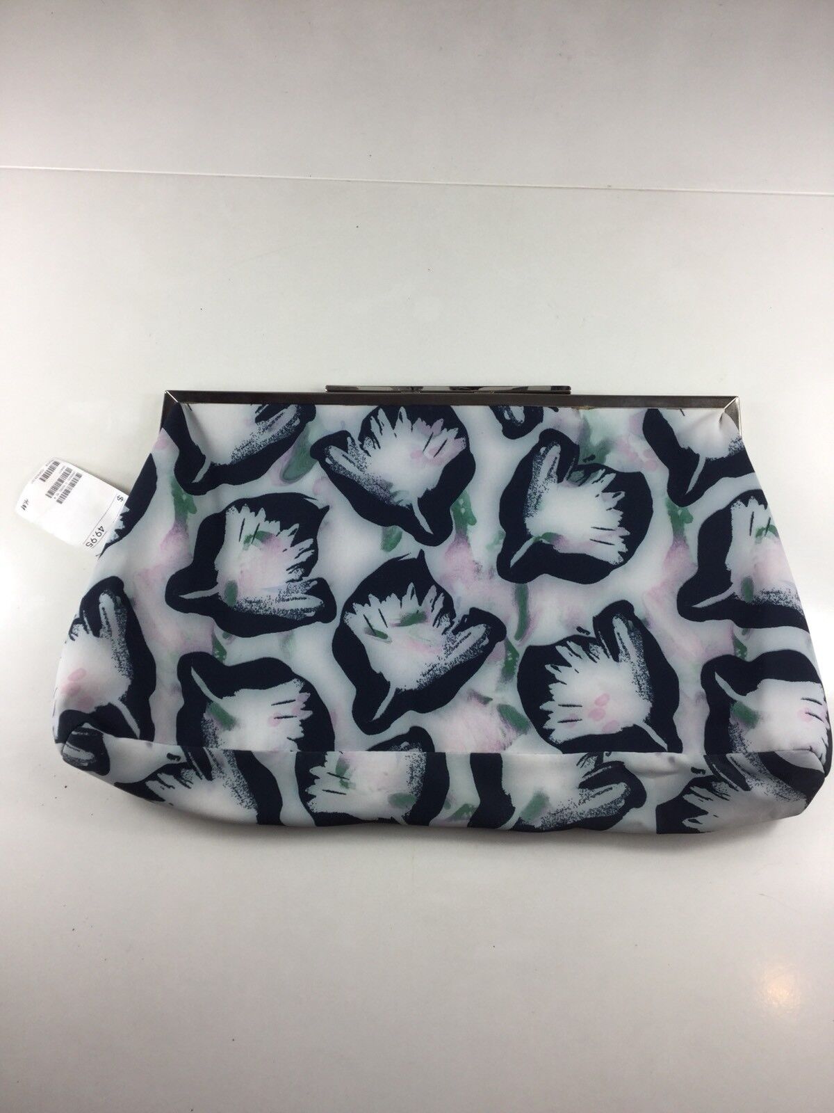 white floral clutch bag