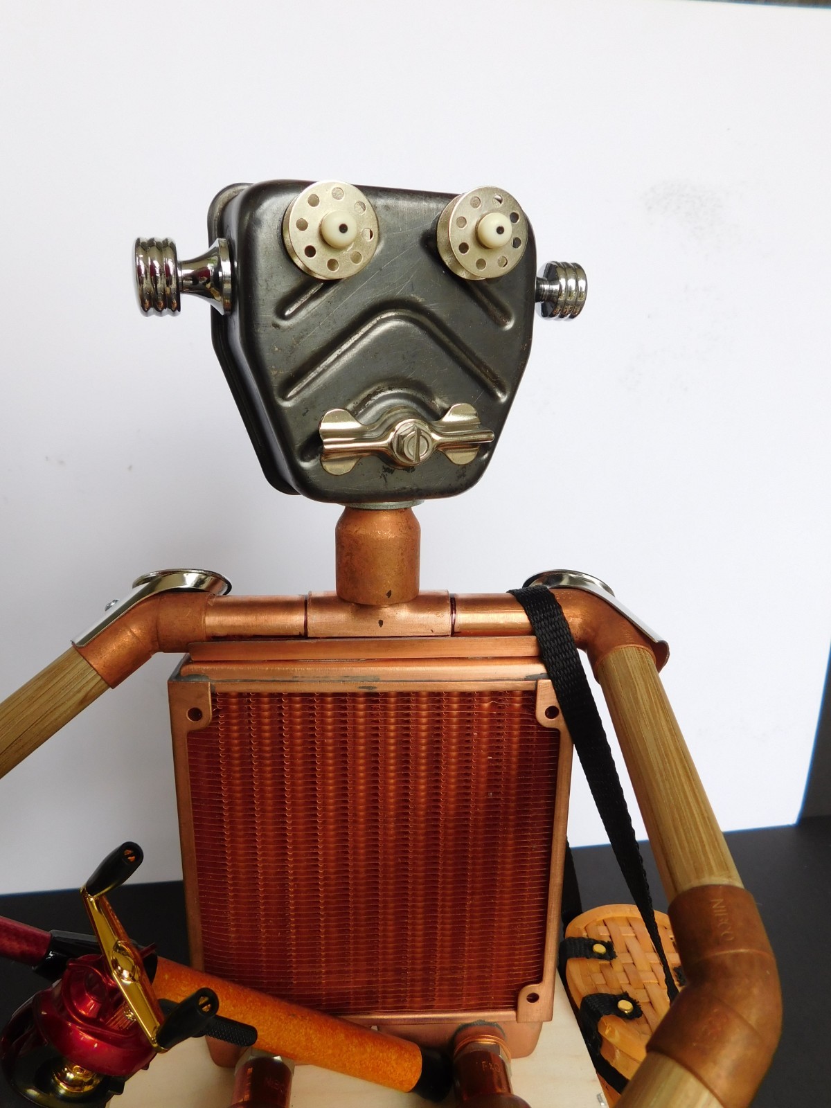 fisherman sculpture, assemblage robot