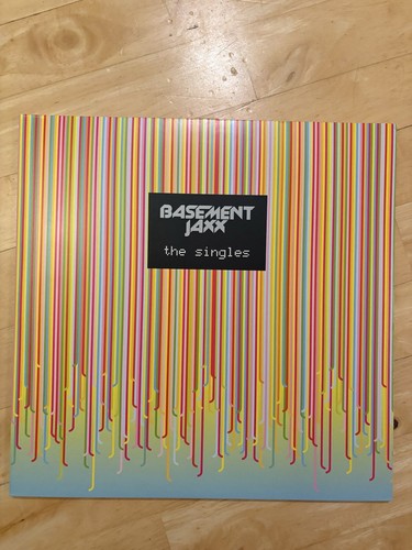 The Singles by Basement Jaxx Double Blue & Yellow Vinyl Used The Singles by Basement Jaxx Double Blue & Yellow Vinyl Used