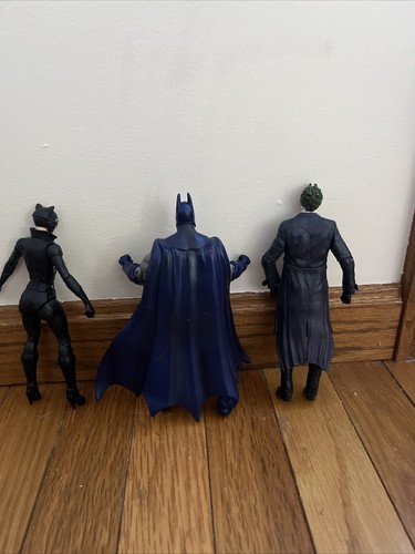 ARKHAM ASYLUM ACTION FIGURES: Batman, Joker, Catwoman. All in good condition
