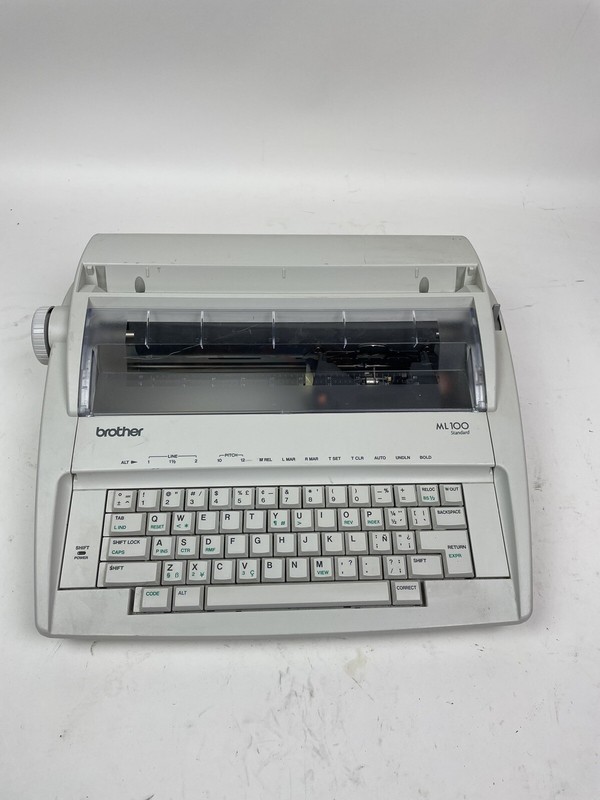 Brother typewriter photos of Brother ML 100 by year then serial number