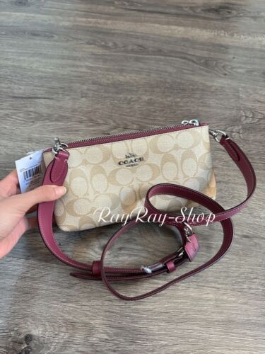 NWT Coach CJ790 Signature Double Zip Crossbody Handbag Light NWT Coach CJ790 Signature Double Zip Crossbody Handbag Light