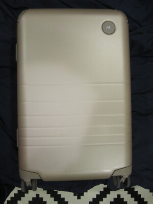 Monos hybrid carry-on plus reinforced clasp luggage champagne
