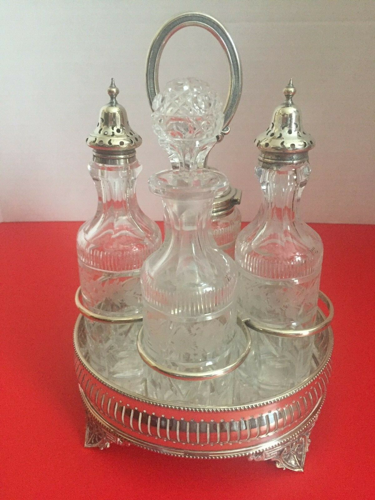 ANTIQUE VICTORIAN SILVER PLATE CRUET SET WITH 4 HAND CUT CRYSTAL CRUET BOTTLES