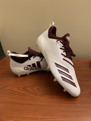 maroon and white adidas football cleats