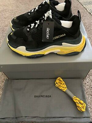 black and yellow triple s