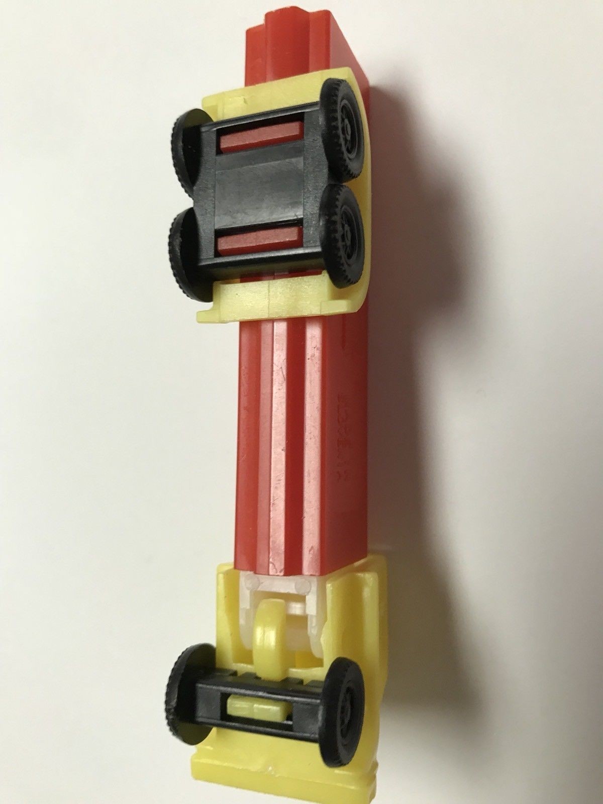 Vintage Truck Pez Dispenser No Feet Slovenia-Red Truck w/ Yellow Cab