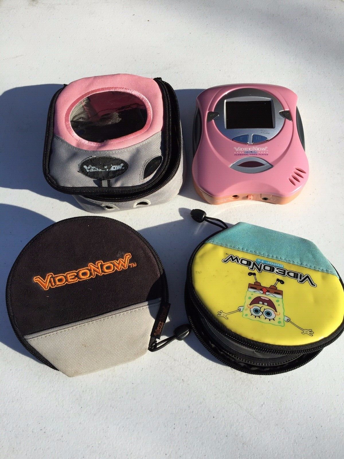 Video Now Color Disc Player Portable Pink w/ Case, 2 Video Cases & 14 Disc