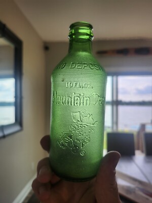 Original  Embossed Mountain Dew Bottle ''It'll Tickle Your Innards''  Mnt Dew