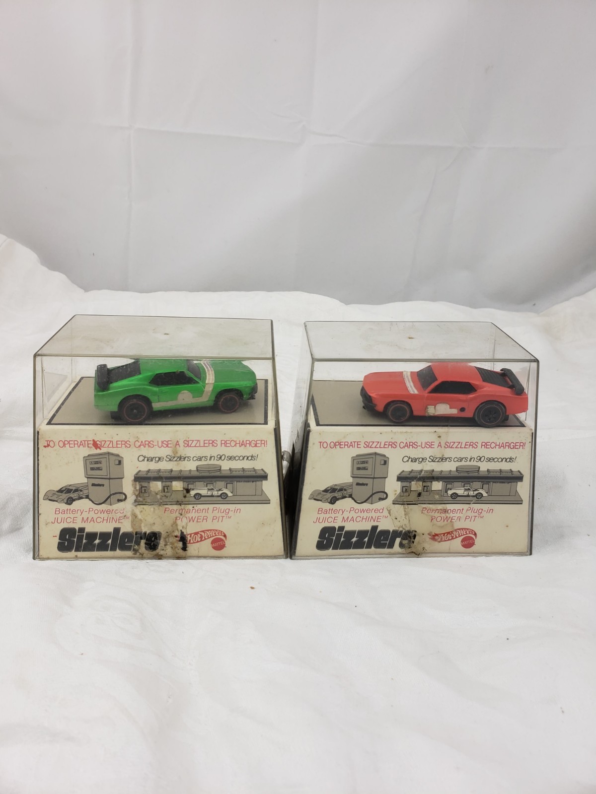 Two Vintage Hot Wheels Sizzlers 1969 Mustangs Red & Green +Original Cases & Pump
