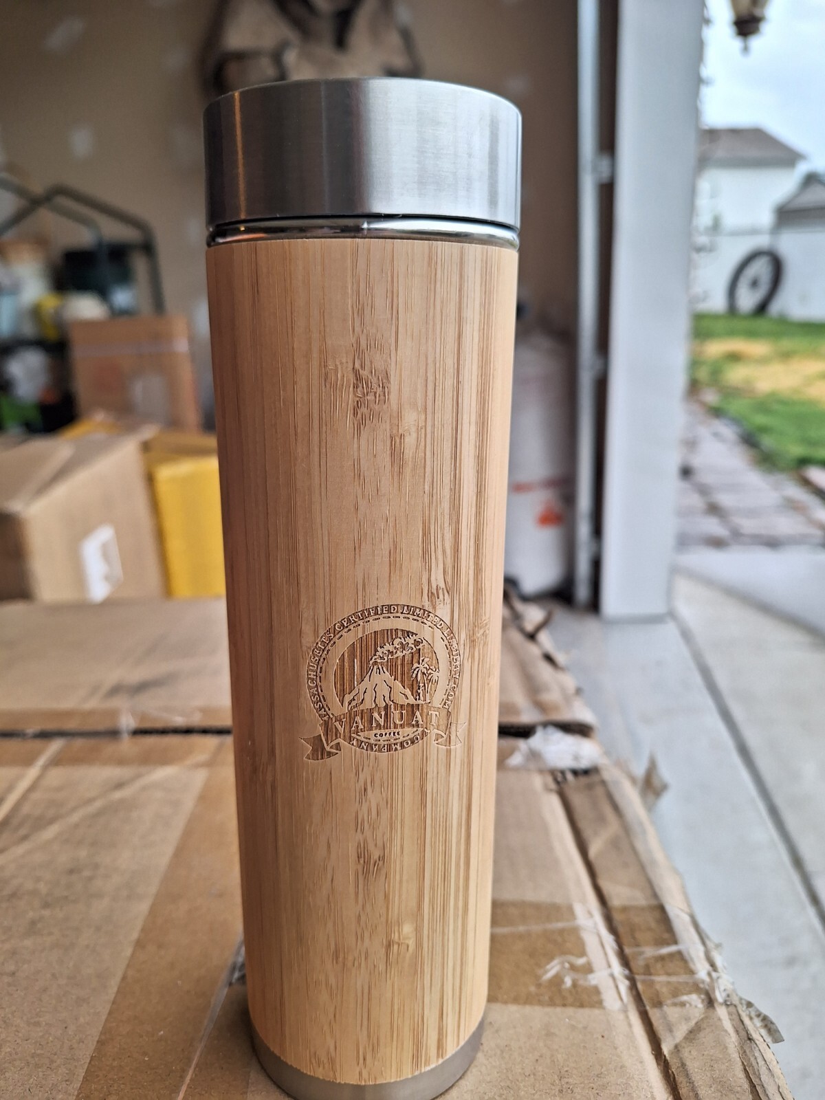 thermos and Tumblers. Stainless steel and Bamboo, 3 different styles