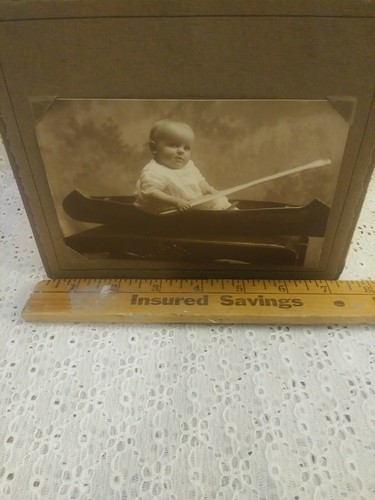 Vintage Black And White Studio Photograph Baby Boy In Canoe With Paddle