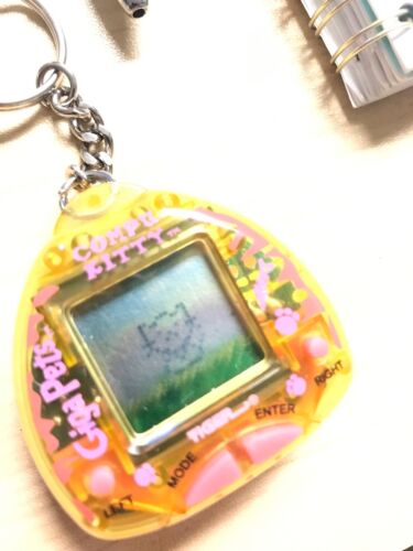 Giga Pet Compu Kitty Yellow New Unopened Sealed Original Giga Pet Compu Kitty Yellow New Unopened Sealed Original