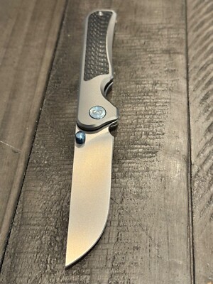 Miguron Knives Pagos II Front Flip Dual Thumb StudS M390 Titanium/CF -Framelock 