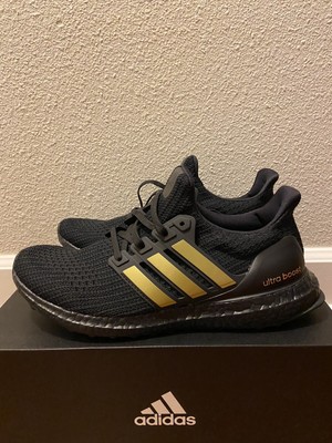 ultra boost dna black and gold