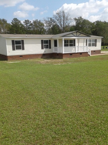 Mobile home with land 7.33 acres and work shop
