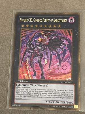 Number C40: Gimmick Puppet of Dark Strings PGLD-EN020 Premium Gold 1st Edition