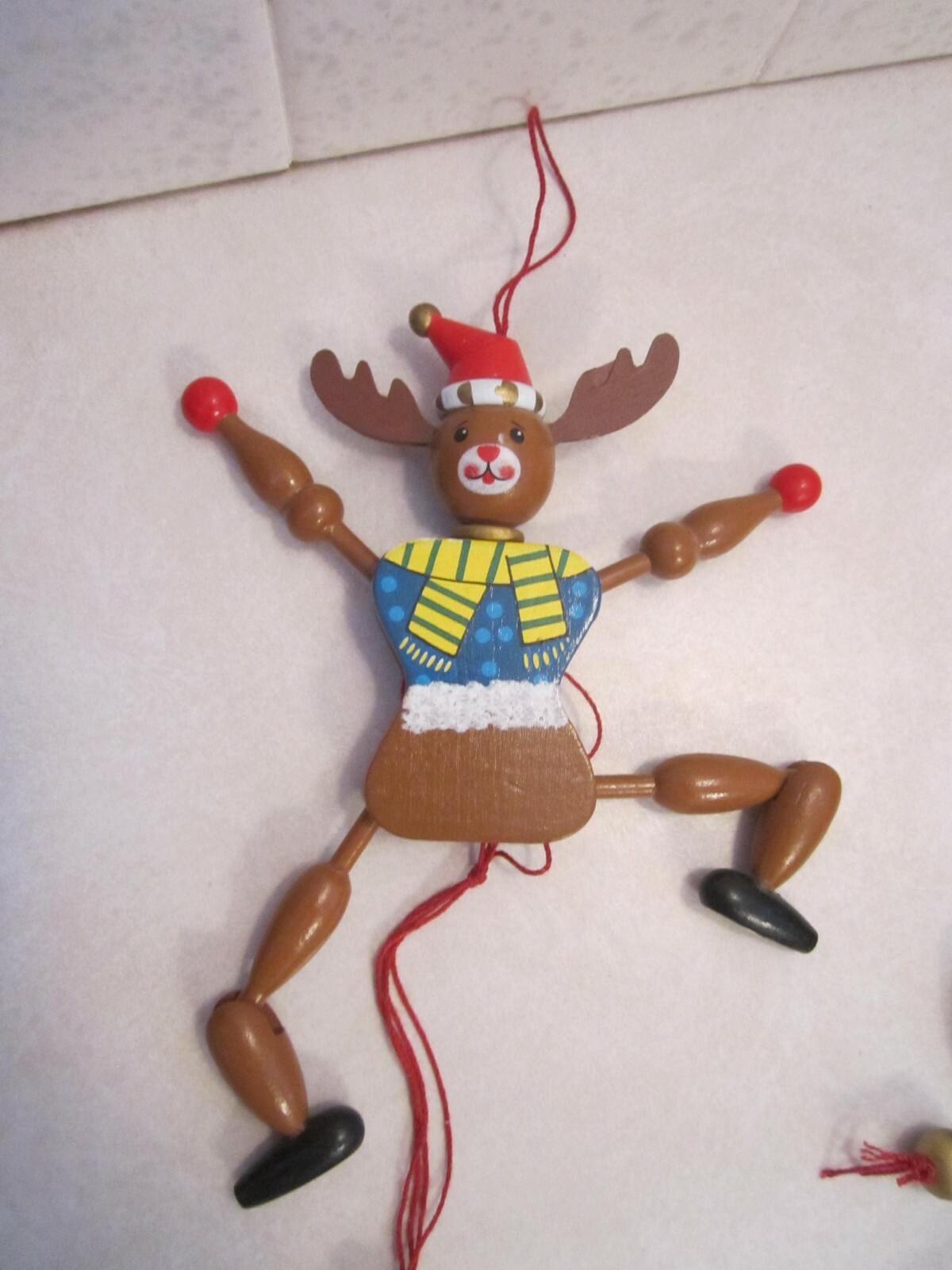 Three wooden jumping-jacks (marionette)  string puppet Santa, snowman, reindeer