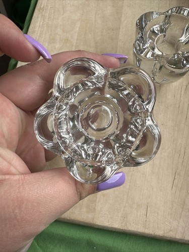 2 flower shaped glass candle holders