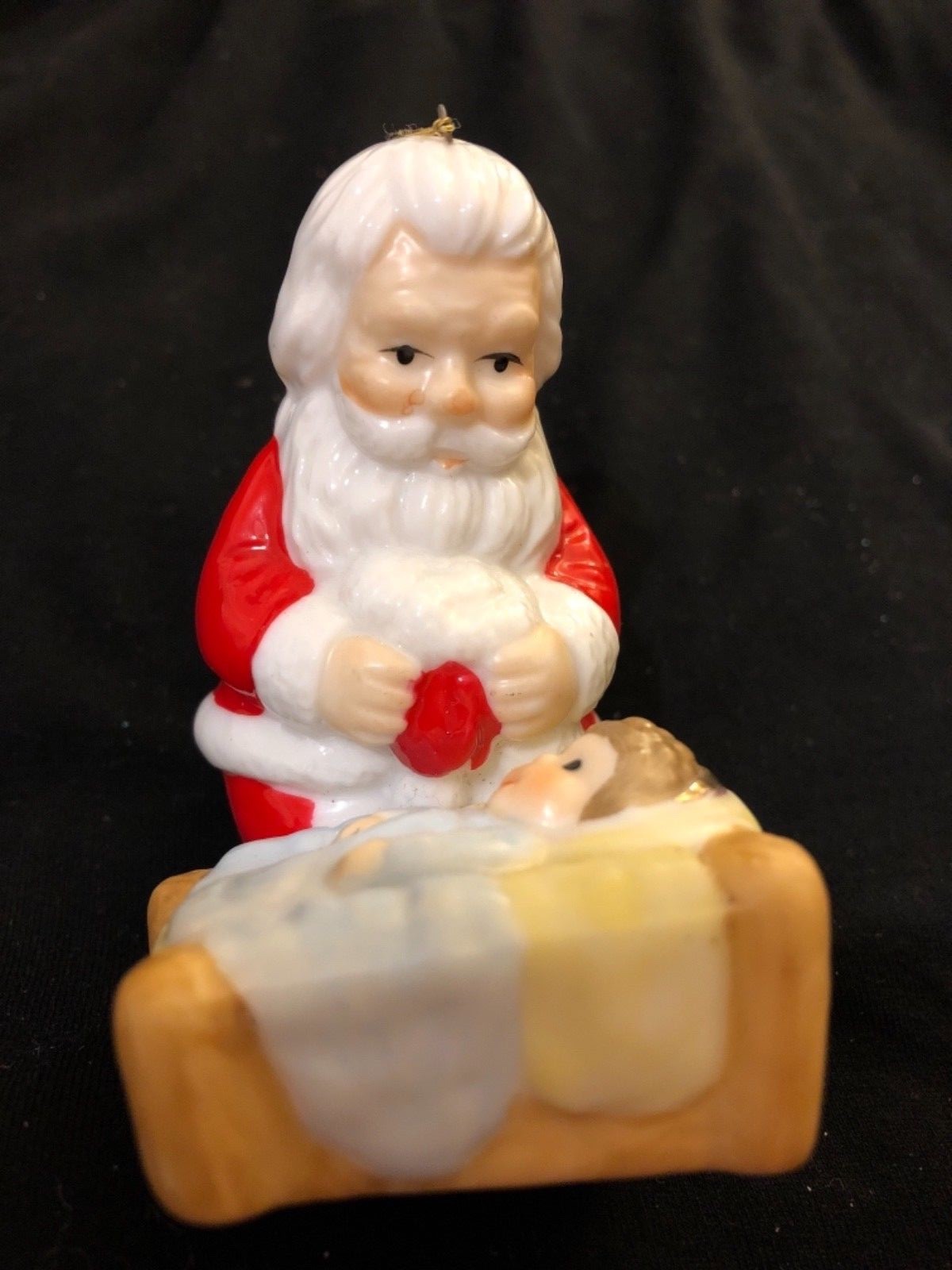 Vintage Christmas Ornament with Santa Bending Over baby Jesus, cute!