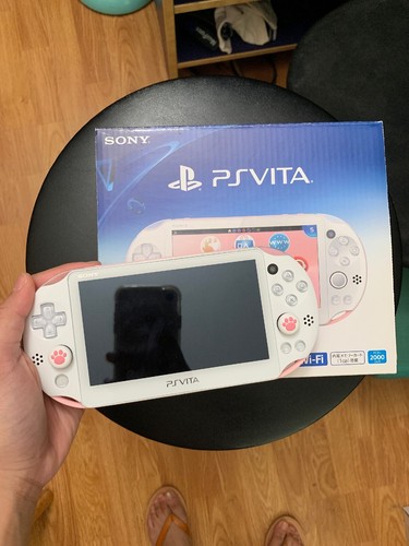 Playstation Vita Light Pink White PCH-2000ZA19 Wi-Fi Model Playstation Vita Light Pink White PCH-2000ZA19 Wi-Fi Model