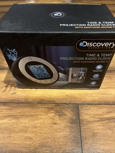 Discovery time & temperature projection radio clock with soothing sound FX w/Box