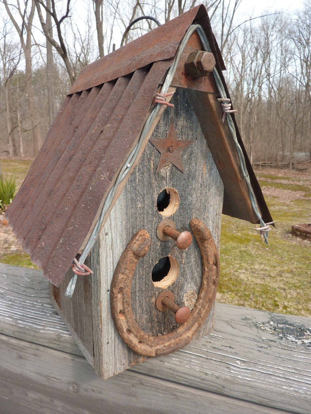 Handmade Rustic Bird House made from old barn wood with tin roof and barbed wire
