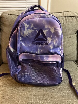 pre owned,Marbled purple Reebok backpack with 5 pockets and laptop sleeve 