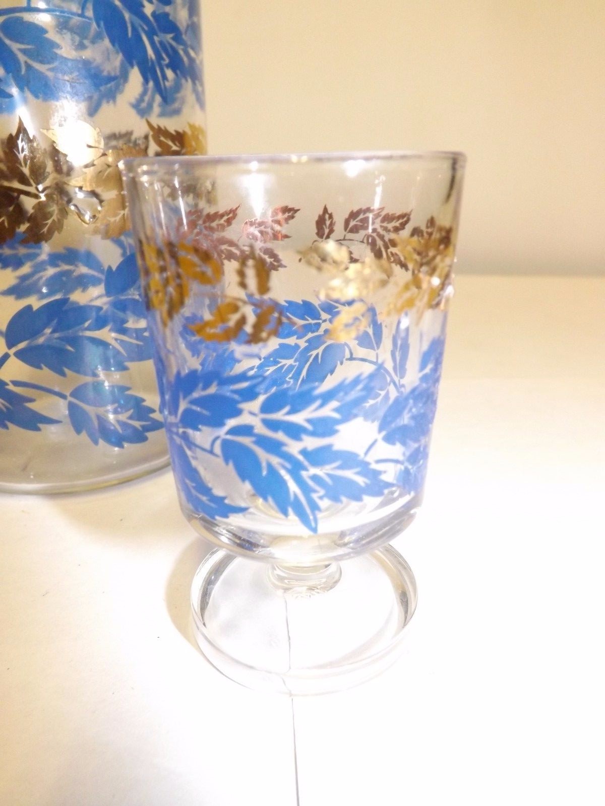 FRANCE MARKED GLASS DECANTER STOPPER & 2 CORDIAL FOOTED GLASSES BLUE GOLD LEAVES