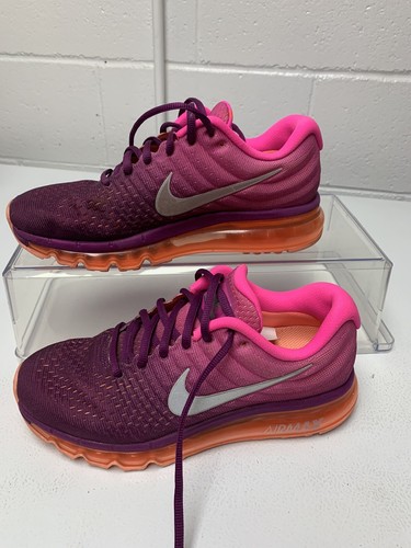 red and purple nike shoes