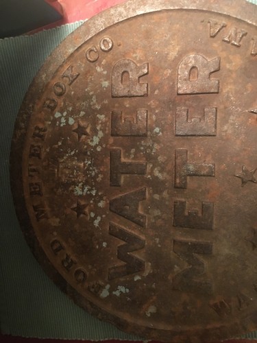 Vintage castiron ford water meter lid